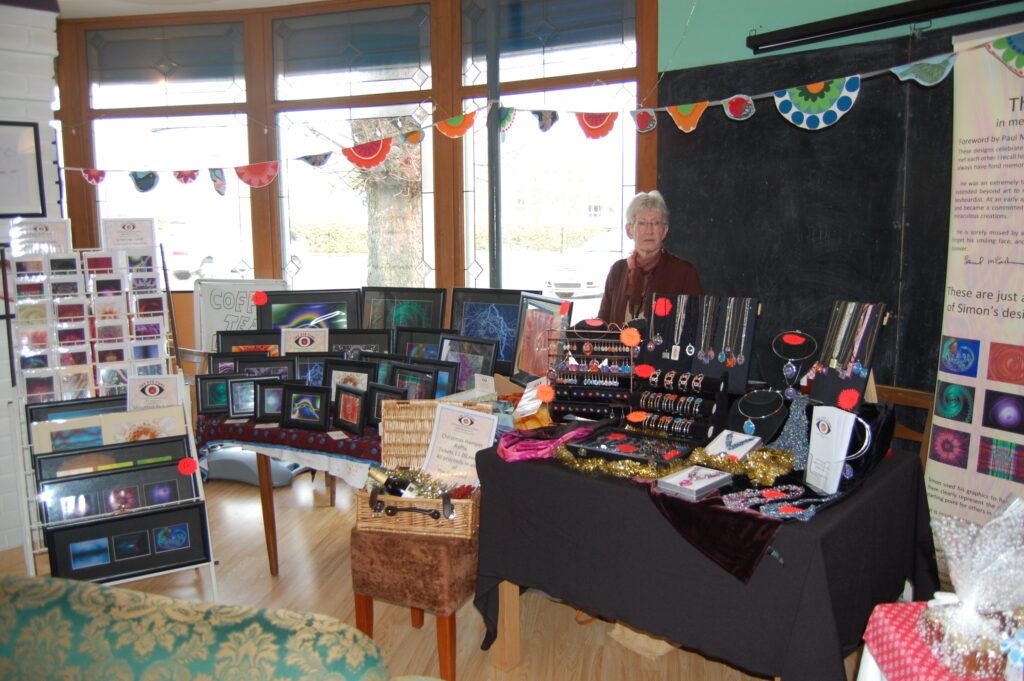 Carol Sherry behind the stall at the 2014 Hope Place Christmas Craft Fair.