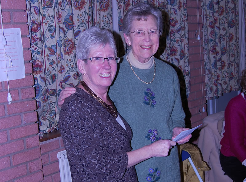Newton Ladies Guild presenting a cheque to Carol Sherry.