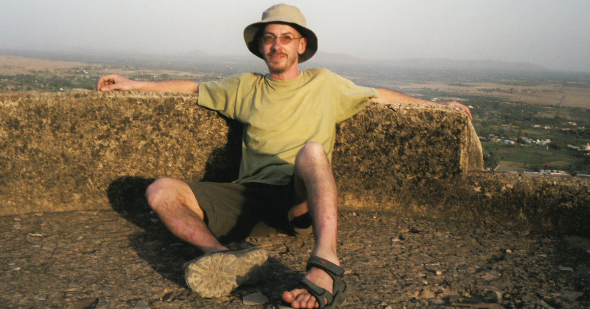 Simon: relaxing on a turret at Kuchaman Fort in Rajasthan, India.