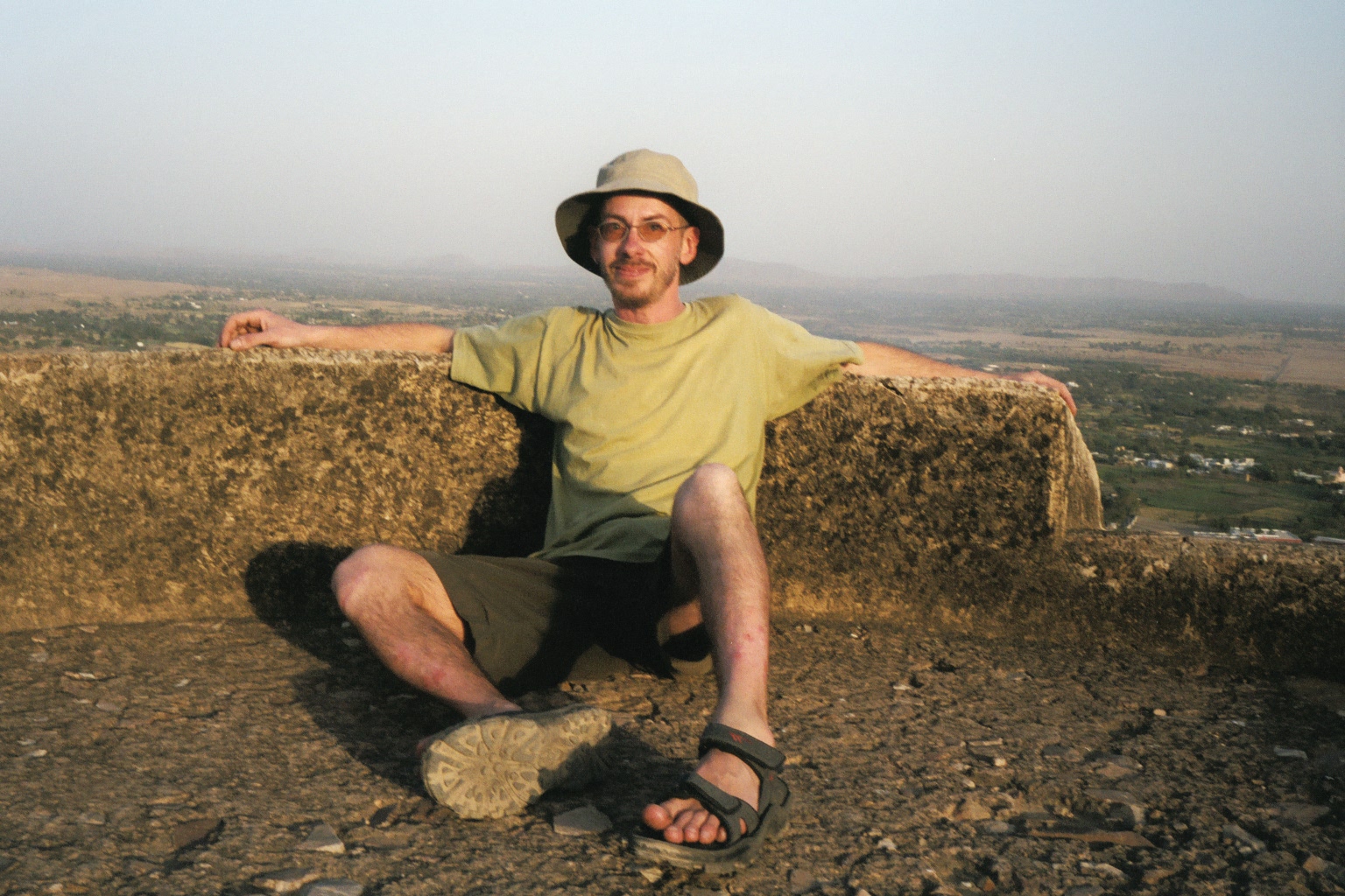 Simon: relaxing on a turret at Kuchaman Fort in Rajasthan, India.